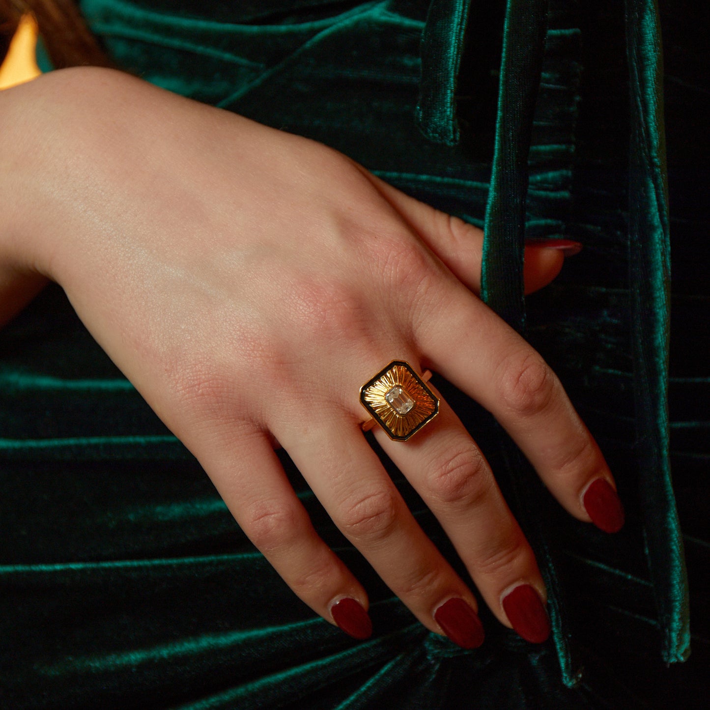 Hand model wearing New York Collection Art Deco Diamond Gold Cocktail Ring with a 0.5ct octagon cut diamond and black enamel from Augustine Jewels